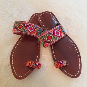 Free people leather beaded toe loop sandals.
